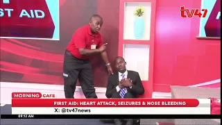 The first aid to give to someone having a heart attack.