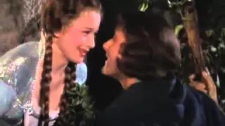 Olivia De Havilland and Errol Flynn kiss from Robin Hood