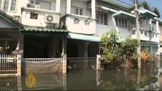 Thailand begins clean up after record floods