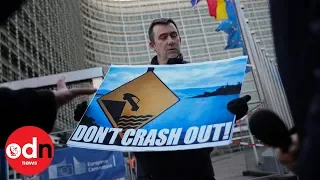 Shocking moment protester blocks Theresa May's car in Brussels