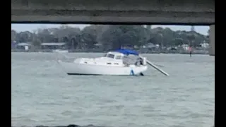 Boat owners having a bad day on the ICW, high winds, dragging boats.