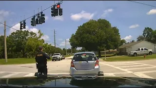 Florida Police officer prevents unconscious driver from rolling into traffic