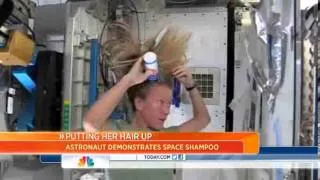 Watch astronaut wash her hair in zero gravity