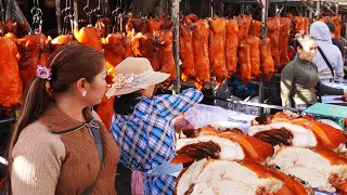 Massive supply of roasted pork at Oruessey market, Phnom Penh food market