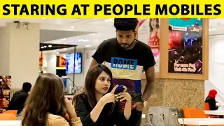 Staring at Strangers Mobiles in Malls Prank - Lahori PrankStar