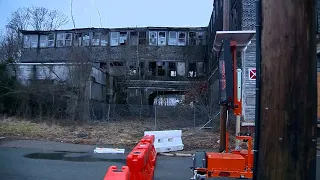 Road closed as officials fear old mill building may collapse