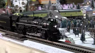 Lionel Legacy Pere Marquette Berkshire pulling a freight