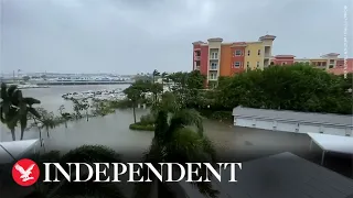 Whole neighbourhoods flooded as Hurricane Ian makes way through Florida