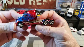 Freeing diecast from their packaging  - Bumblebee and Optimus Prime