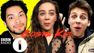 "Do you watch Cobra Kai?!"  Xolo Maridueña, Mary Mouser & Jacob Bertrand on fans and fights