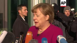 Merkel arrives for talks on new German government