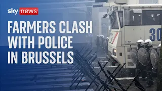 Protesting farmers clash with police outside EU headquarters in Brussels