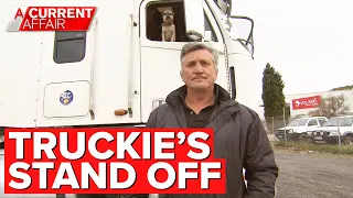 Truckie and his dog sleep at petrol station for weeks after dispute | A Current Affair