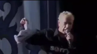 Heckler throws shoe at Johnny Rotten (Sex pistols at The Crystal Palace, 2002)