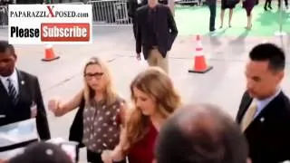 Amy Adams walks across street to greet her fans at the premiere of Trouble With The Curve