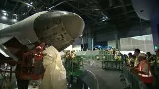 Workers Take the Wraps Off Atlantis