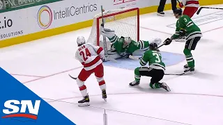 Anton Khudobin Stretches Out To Rob Jake Bean With Shaft Of Stick