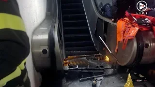 Firefighters rescue soccer fans after escalator collapses in Rome metro