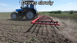 How does a spring-tooth harrow work ?