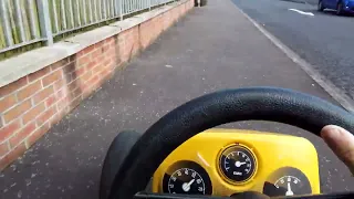 Driving my go kart out. Around the estate.