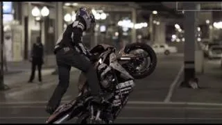 Stunt Motorcyclist in Downtown Chicago - Red Bull Night Tracks