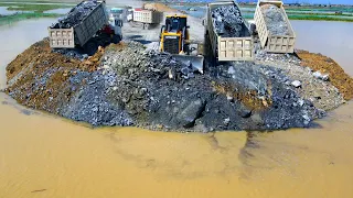 Incredible Nice stone-pushing bulldozer,SHACMAN truck dumping enormous stone, building road on water