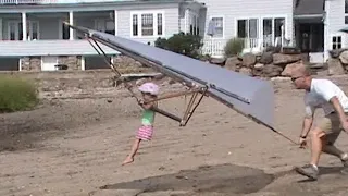 child hang gliding