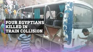 Four killed and 26 injured when train collided with bus carrying factory workers in Helwan, Egypt