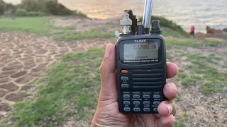 Yaesu VR-500 listening to ham operators with a whip antenna on 40 meters