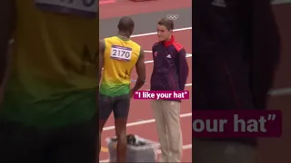 Usain Bolt gives a lucky volunteer his hat!