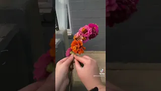 Making a flower crown with real flowers. Zinnias and marigolds