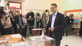 Greek PM Mitsotakis votes in election | AFP