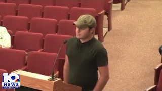 Man brings gun to Virginia school board meeting