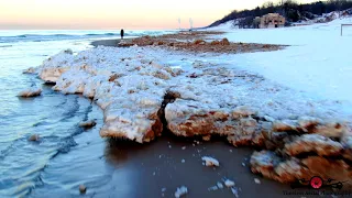 Winter Sunset At Indiana Dunes State Park With the Start of Shelf Ice 4K Drone Footage