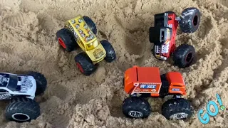 Monster Trucks Race To The Dirt Hill!