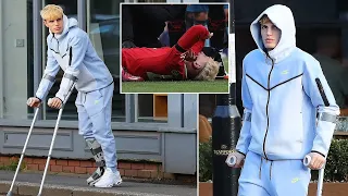 Injured Manchester United star Alejandro Garnacho spotted with crutches and wearing a 'moon boot'