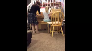 Piano with instructor, age 5