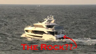 92ft "THE ROCK" yacht by Horizon heading into the sunset from Port Everglades in Fort Lauderdale, FL