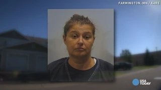 Mom accused of driving drunk with kid hanging from car