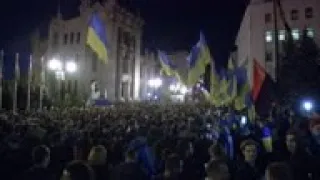 Protesters rally against new accord in east Ukraine