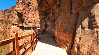 Walking on the high-altitude plank road in the East Taihang Scenic Area.