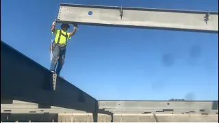 Ironworkers connecting Stockton California hot day