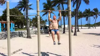 41 yr old man doing muscle ups at Miami Beach