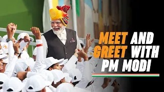 PM Modi greets children at the 77th Independence Day 2023 Celebrations at Red Fort, Delhi