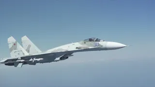 Russian aircraft intercepts US Air Force B-52 bomber conducting routine operations over the Black