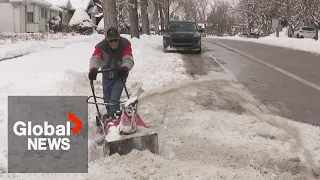 Calgarians dig out after spring storm brings over 20 cm of snow