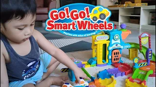 Let's build the Go Go Smart Wheels Police Station and Track Pack with Blue Race Car