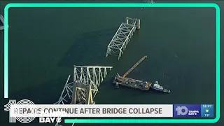 Cranes arrive to start clearing debris at Baltimore bridge collapse