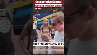 Man eats kebab in front of animal rights activists