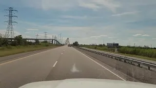 driving across the tall, steep, scary Rainbow Bridge in TX